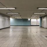 an empty parking garage with no one in it