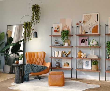 brown and black armchair beside white wooden shelf